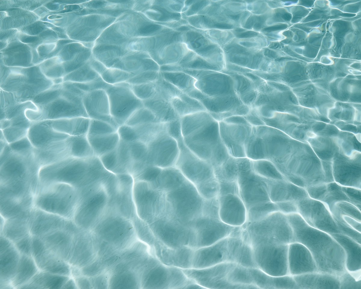 Pool water over a white plaster finish